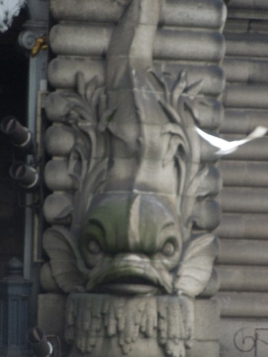 Sculpture on bridge, the River Seine.
