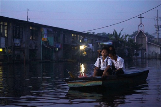 Students go to the morning shift of school as early as 5:30am riding a boat.