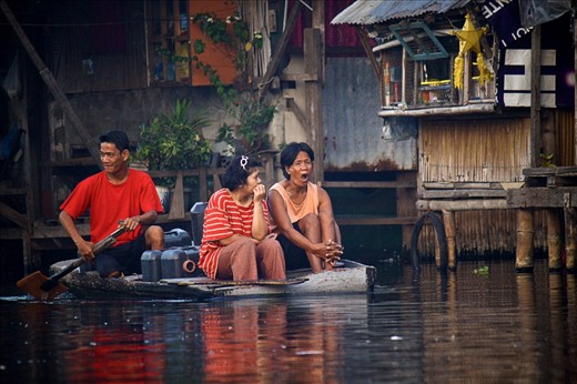 Work starts early in the morning. Residents usually get water first from the public pump. They pay 5php every gallon.