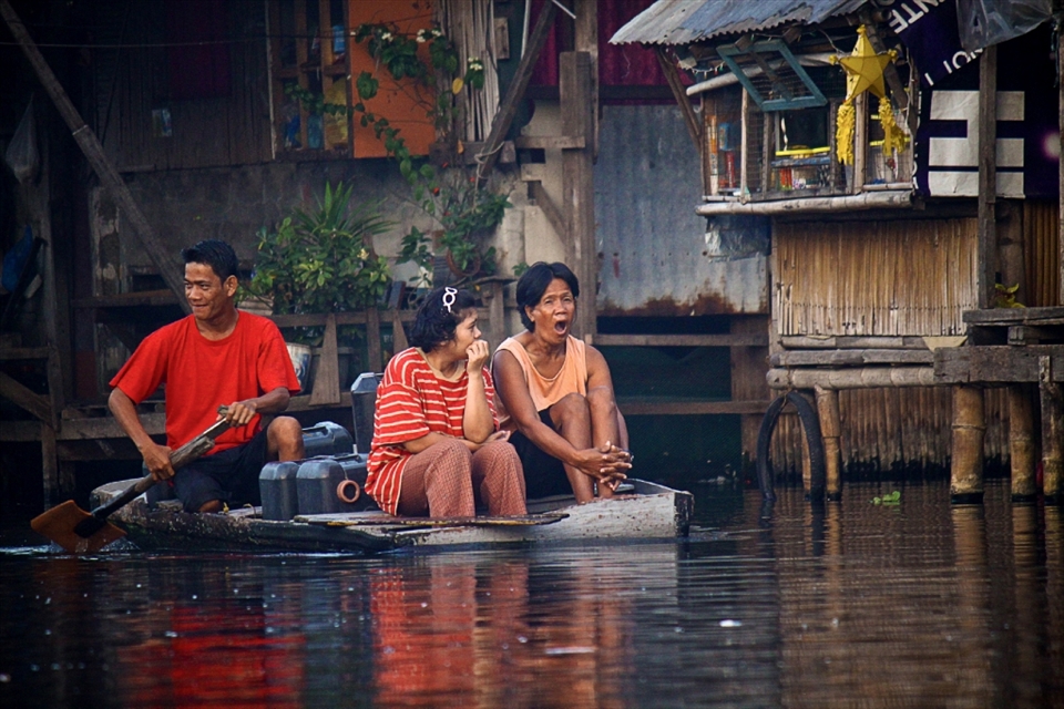Work starts early in the morning. Residents usually get water first from the public pump. They pay 5php every gallon.
