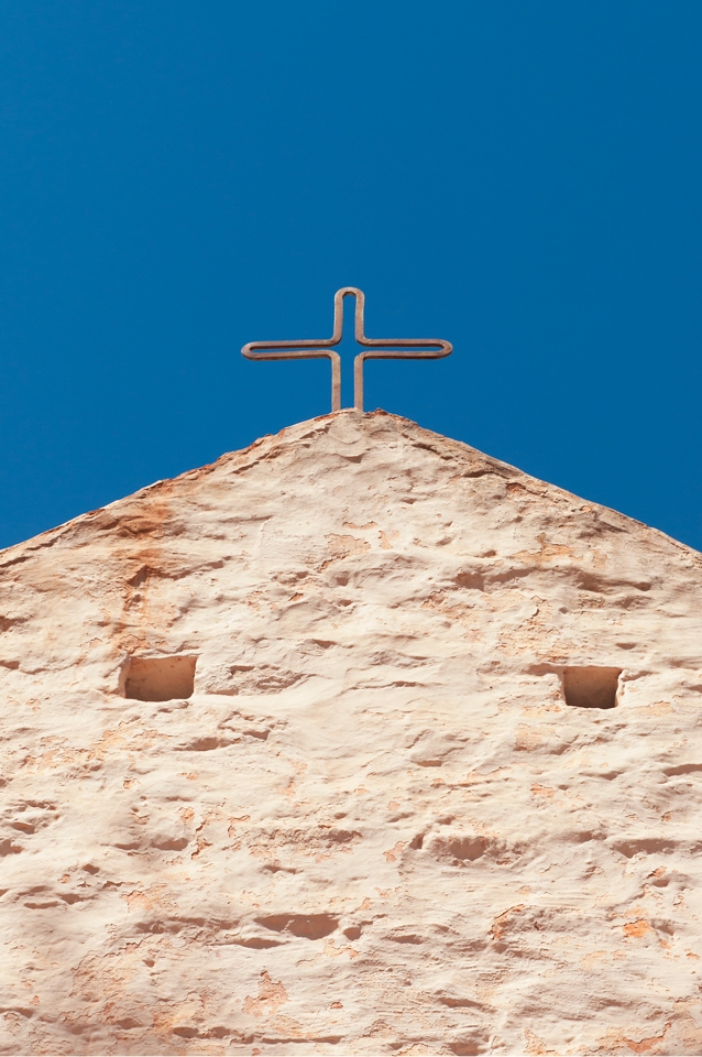 The Hermannsburg mission was established by the German Lutheran pastors Kempe and Schwarz in 1877 on the traditional lands of the Western Aranda people. It is 130km southwest of Alice Springs. 

This church was built in 1897 after the original was destroyed in heavy rains. It features an inscription in English, German and Aranda.

The missionaries abandoned the site in 1891, broken by extreme isolation and family illness. This abandonment would be temporary, with a new mission established within three years.  