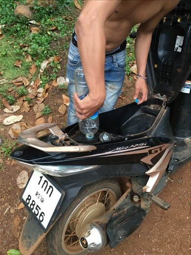 The gas station on Koh Mak consist of gas in water bottles!
