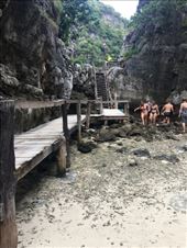 The rocky cave that you walk through to get from the boat to Maya Bay.  Everyone wished they had shoes!: by kirmily, Views[193]