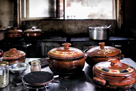 I was ushered back into the kitchen and shown a selection of dishes. The pots bubbling away on the stove produced the most amazing aroma. There were fresh herbs drying in the window and an old woman rolling dough in the corner. The kitchen was rustic and authentic. It was the sort of place you wanted to explore, smell the herbs, feel the flour between your fingers, enjoy the patch of sunshine, taste test….everything.