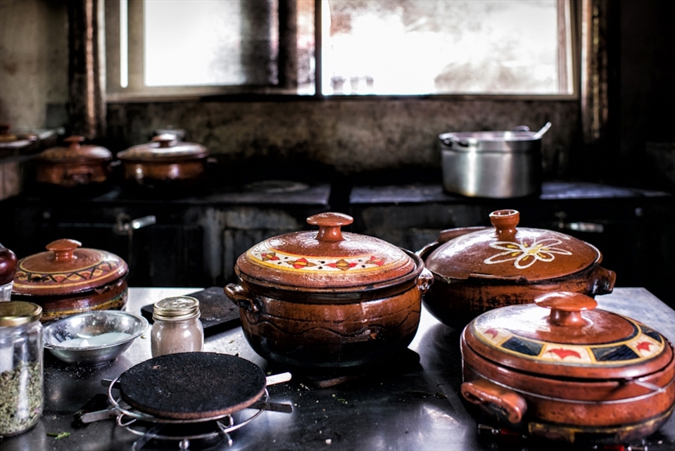 I was ushered back into the kitchen and shown a selection of dishes. The pots bubbling away on the stove produced the most amazing aroma. There were fresh herbs drying in the window and an old woman rolling dough in the corner. The kitchen was rustic and authentic. It was the sort of place you wanted to explore, smell the herbs, feel the flour between your fingers, enjoy the patch of sunshine, taste test….everything.