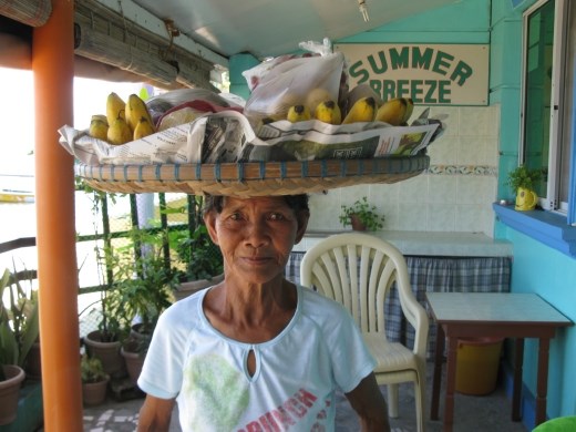 lady who sold us fruit every morning- very heavy basket!