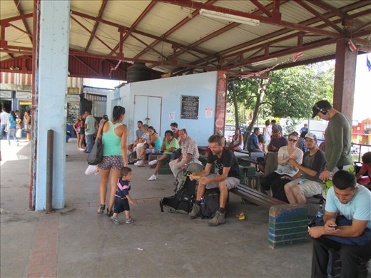 Arnold waiting for the bus to San Jose at Quepos