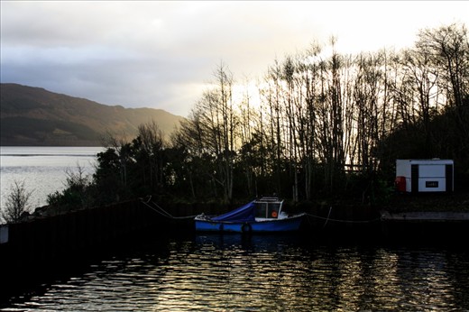 Arriving back where the cruise started; a pier by the Loch 