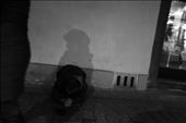 2nd picture about homeless people in Prague. I took it in Old town of Prague, and the homeless man was shadowed by a woman, i feel that rich people to bear hard upon poor people.: by kitara, Views[805]