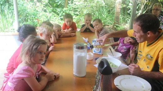 The kids are enjoying preparing zucchini bread