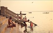  A typical scene in the bank of the Ganges river. Meditating, Washing, Bathing and Basking in the morning sun.: by kjborja, Views[585]