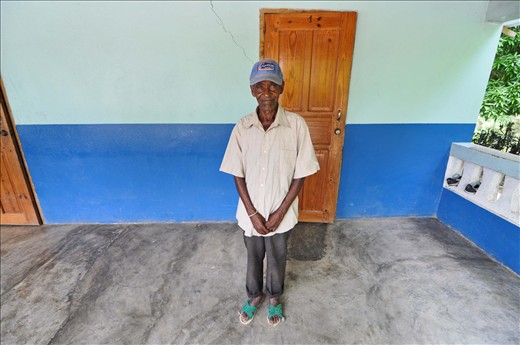 This photo always reminds me that pride is something independent of wealth or status. While I was out photographing in the community, this man approached me and asked if I would mind taking his photo. I graciously accepted, and he then asked for a few minutes to change into his nicest shirt. 