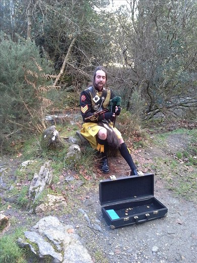 My bagpiper who led me to the cemetery