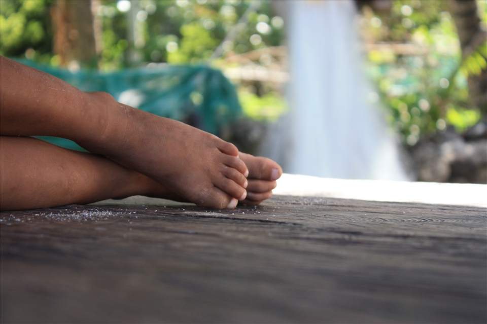 Today They Rest - son of a fisherman taking his afternoon 