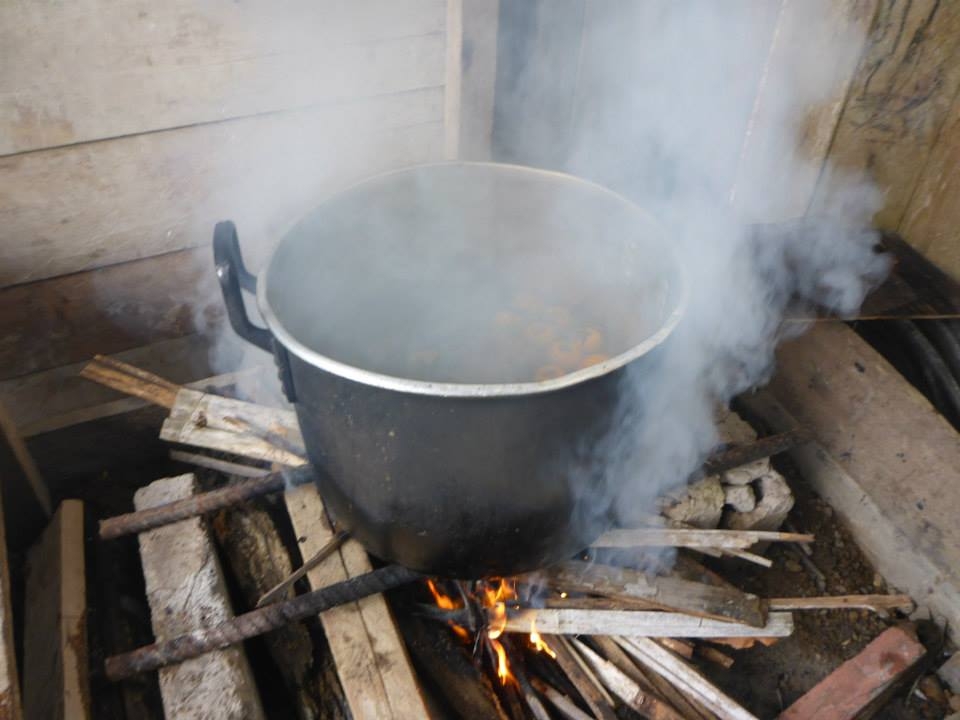 Colada Morada boiling on the stove.