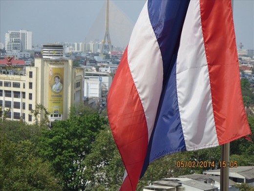 View with Thai flag and ubiquitous image of the King