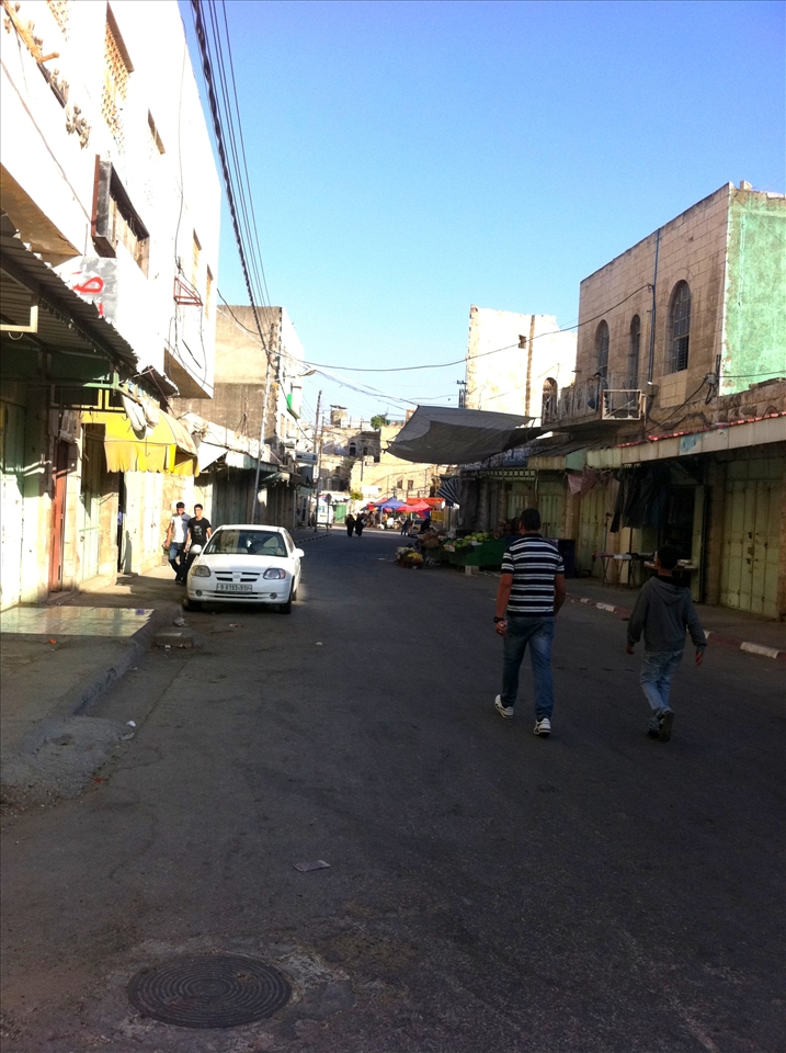 A deserted side street in Hebron, Palestine