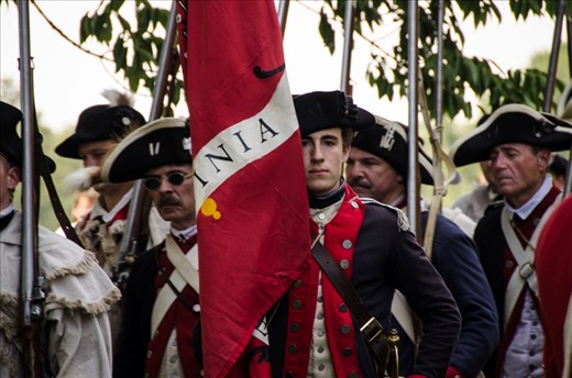 Silence falls as the flag bearer prepared to march.