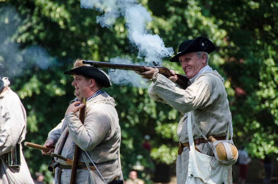 Riflemen-sharpshooters, sporting less stuffy uniforms flank the march. This man is especially popular with the audience, even as he breaks character to gruffly warn some spectators out of the way. His gun is awfully loud and is a clear winner in the smoke-circles category.
