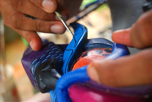 Hugo Fernandez Rojos delicately adds the finishing touches to a traditional Brun