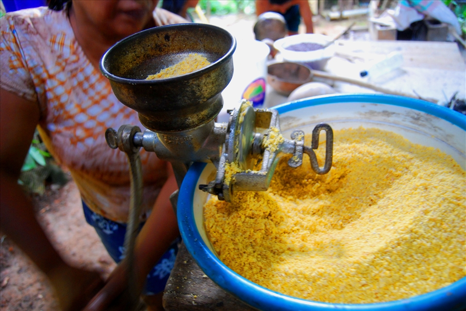 This corn Marta Fernandez Rojas grinds by hand will be used in a delicious fried
