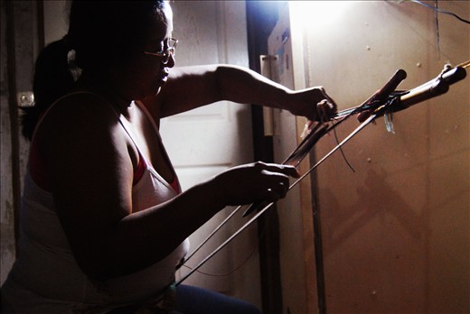 Marta often spends her evenings at home cheerfully weaving in the traditional Br