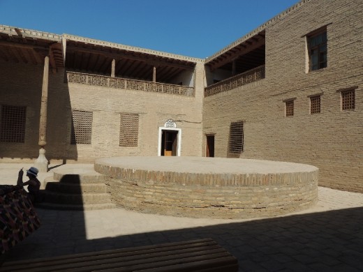 ruler's residence ceremonial courtyard; he'd put a yurt on the round stage