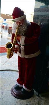 Santa at gas station en route to Alexandria: by krodin, Views[532]