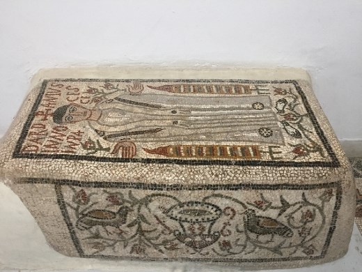 mosaic covered tomb