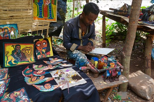 local artist painting w flowers for dyes