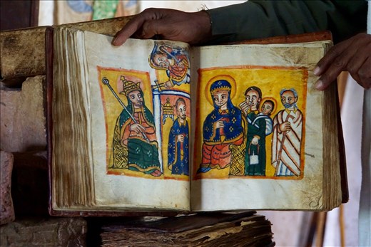 300 yr old Marian stories book held by priest in Yeha