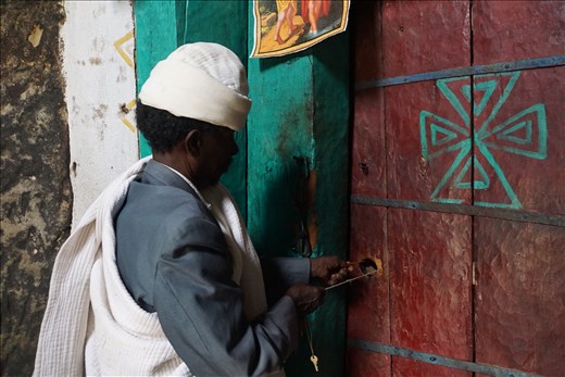 wooden key trick to unlock church door