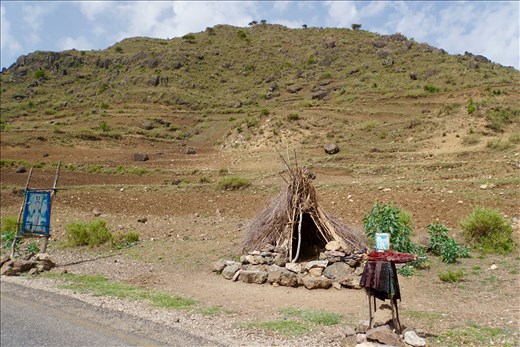 Holy Man's hut beside road