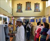 Getting money to pay for prayers at Ganden Monastery: by krodin, Views[273]