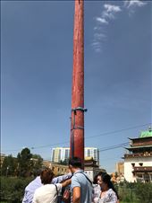 Red Wishing Pole, last bit of wood from Soviet destroyed temple, Ganden Monastery: by krodin, Views[295]
