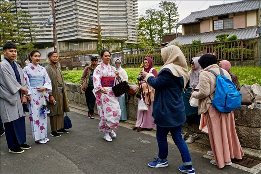 Folks from different cultures taking pictures of each other, Inari