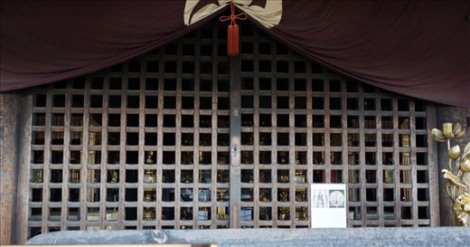 Temple grate hiding figures, Nara