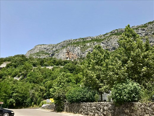 Ostrog Monastery - tiny white spot - from the parking lot