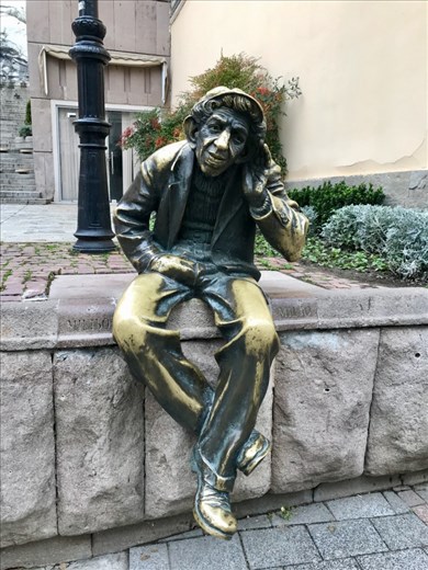 Miljo, was an historical figure during the mid-20th C.  Legend has it that if you tell him a wish it will come true, and if you rub his knees/thighs your love life will improve. Main pedestrian street.