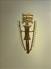 Shaman using palm leaves to create wind that calls the spirits, Museo del Oro: by krodin, Views[130]