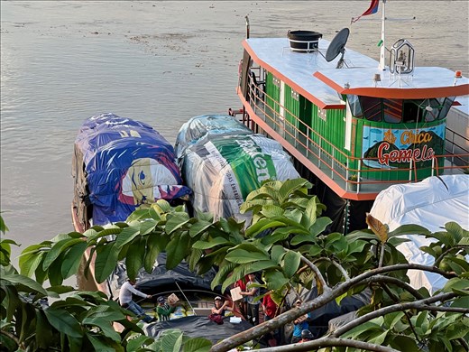 Loading boats for the two week ride down river to deliver goods