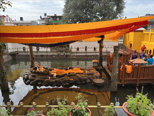 Budhanilkantha - otherwise known as Jal Narayana - the Sleeping Vishnu (he sleeps 6 months and is awake 6 months and lies on a bed of Nagas - snakes)