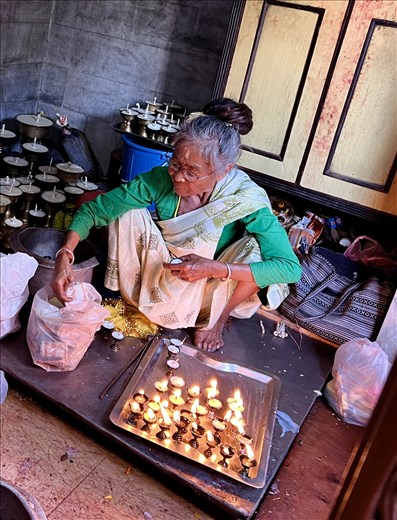 Woman selling prasad in Banglamukhi Temple, Patan