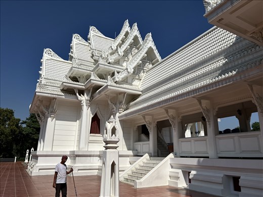 Thai Temple - and cleaner wanted his photo taken