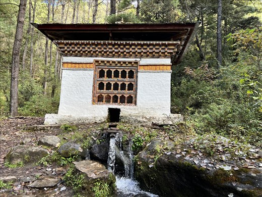 Chorten house with water powered praye rwheel, on path to Tiger's Nest