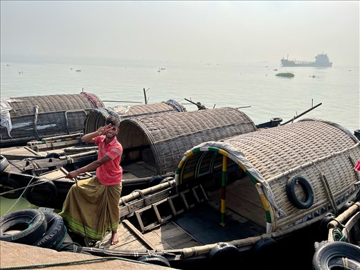 Ferryman with ferry, Meghna River