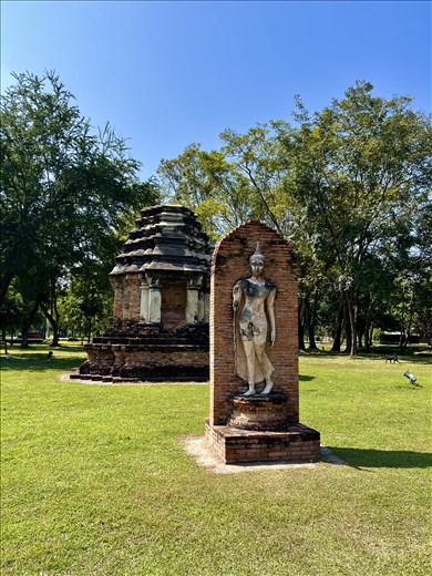 walking Buddha sculpture
