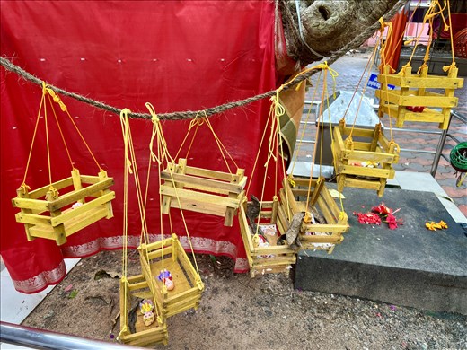 cradles with babies on the wishing tree