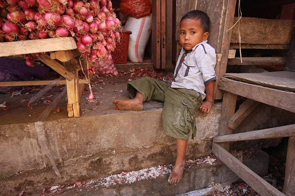 children playing, studying, working and growing on the workplace of parents.