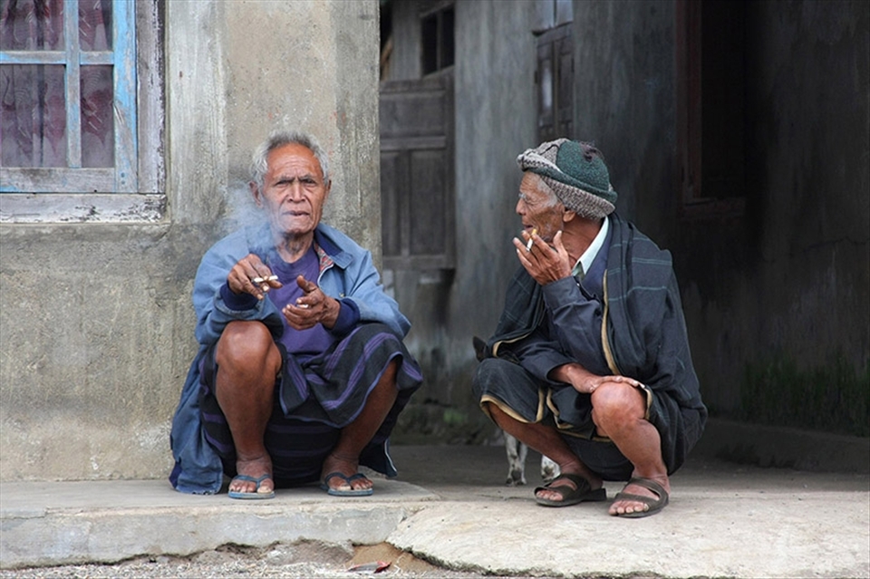 oldmens from pagan village discuss about life and smoke all day. 
